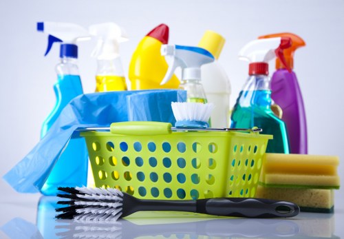 Cleaning staff and compliance paperwork representing anti-slavery controls