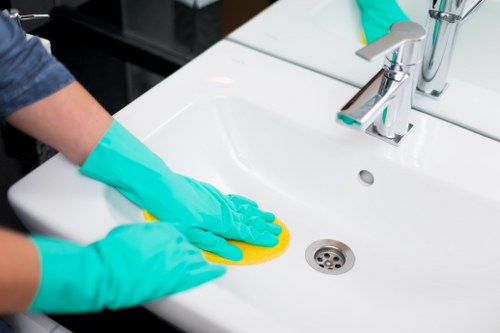 Professional Balham cleaner applying a safety-first cleaning approach